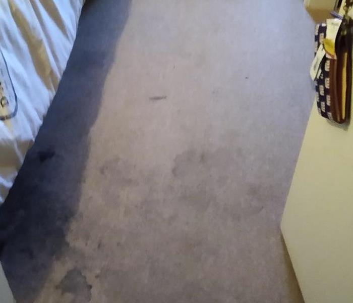 Carpet affected with water damage after a fire